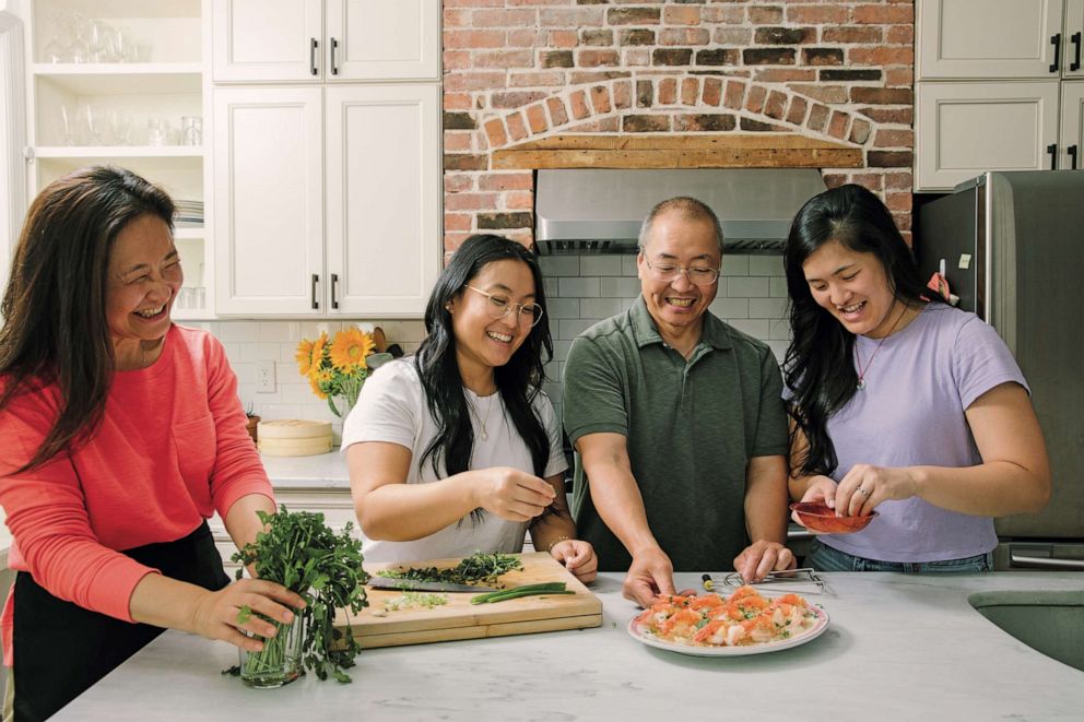 PHOTO: The Leung family of "The Woks of Life" cooking together for their new cookbook.