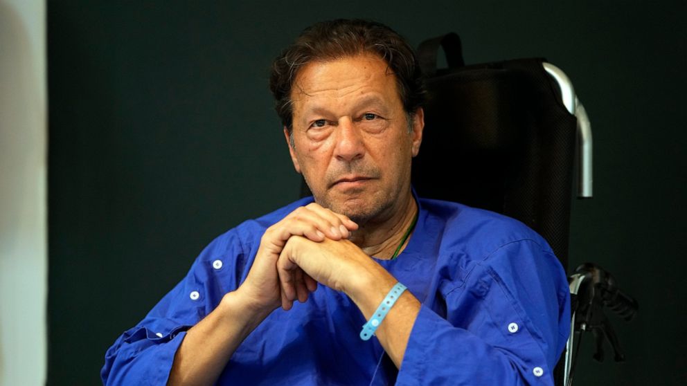 FILE - Former Pakistani Prime Minister Imran Khan speaks during a news conference in Shaukat Khanum hospital, where is being treated for a gunshot wound in Lahore, Pakistan, on Nov. 4, 2022. Imran Khan says a protest march toward the capital Islamaba