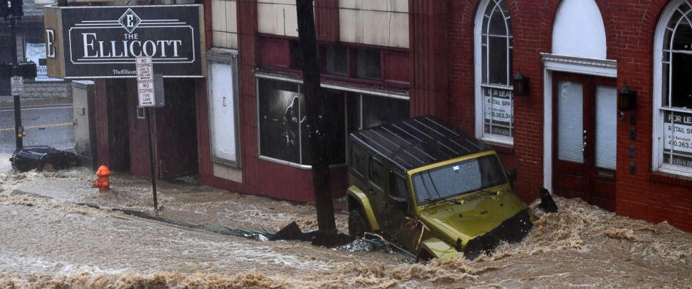 alberto lingers amid maryland floods and record highs in midwest