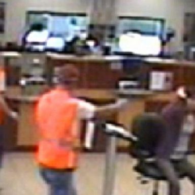 VIDEO: Two men rob a bank at gunpoint in Katy, Texas: Part 1