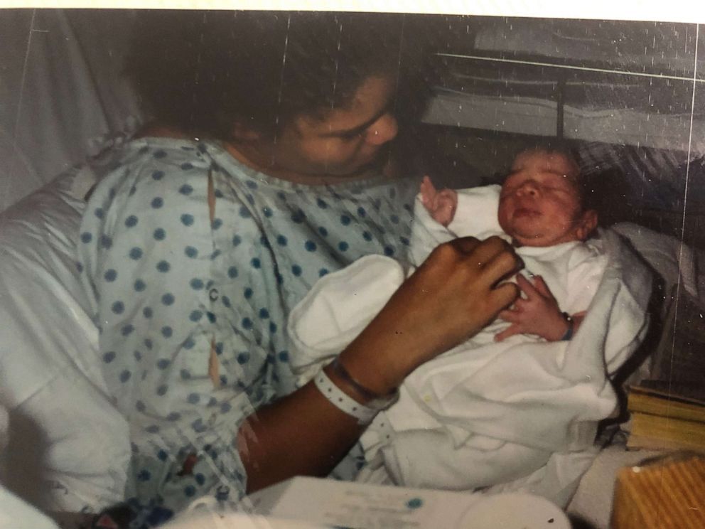 PHOTO: Brandi Henderson holding her newborn son Tyrece Woods. 