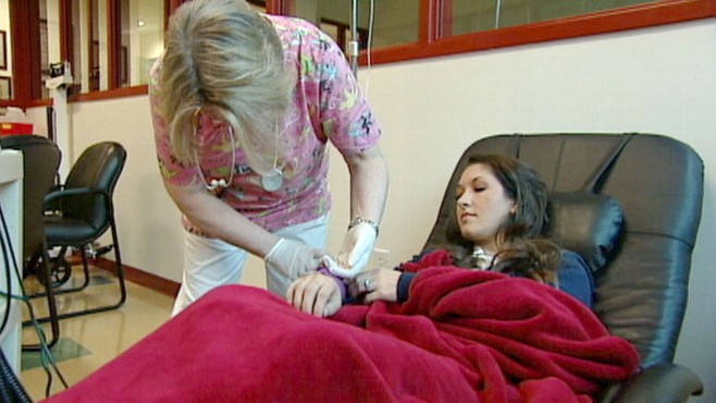girl walks backwards after flu shot