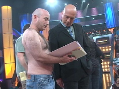 VIDEO: Howie Mandels creative consultant goes over script pages shirtless.