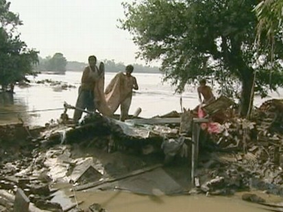 VIDEO: Monsoon rains unleash raging water in the countrys worst recorded floods.
