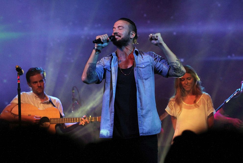 PHOTO: In this July 14, 2013, file photo, Pastor Carl Lentz leads a Hillsong NYC Church service at Irving Plaza in New York.