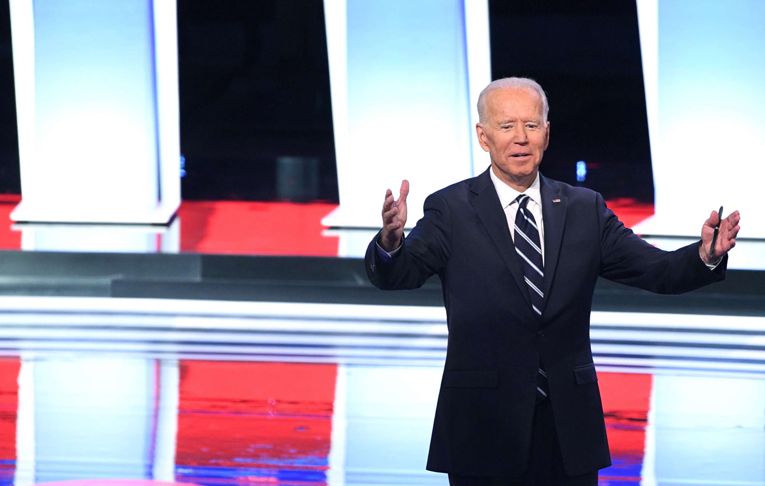 PHOTO: Democratic presidential hopeful former Vice President Joe Biden gestures after the second round of the second Democratic primary debate of the 2020 presidential campaign in Detroit, July 31, 2019.