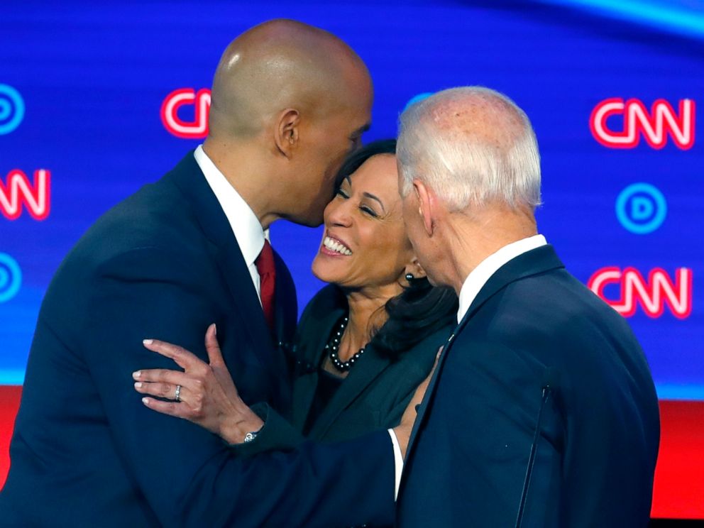 PHOTO: Sen. Cory Booker, former Vice President Joe Biden and Sen. Kamala Harris, D-Calif., talk after the second of two Democratic presidential primary debates, July 31, 2019, in Detroit.