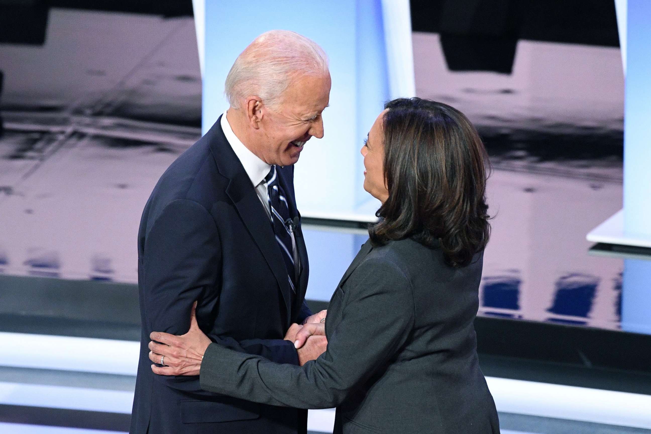 PHOTO: Democratic presidential hopefuls former Vice President Joe Biden and Sen. Kamala Harris greet each other ahead of the second round of the second Democratic primary debate  in Detroit, July 31, 2019. 