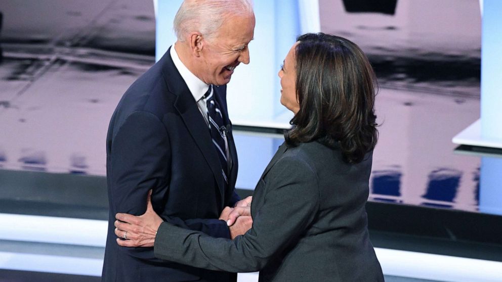 PHOTO: Democratic presidential hopefuls former Vice President Joe Biden and Sen. Kamala Harris greet each other ahead of the second round of the second Democratic primary debate  in Detroit, July 31, 2019. 