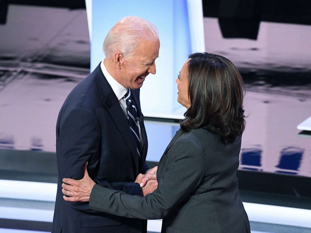 PHOTO: Democratic presidential hopefuls former Vice President Joe Biden and Sen. Kamala Harris greet each other ahead of the second round of the second Democratic primary debate in Detroit, July 31, 2019.