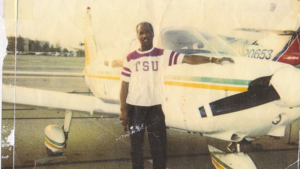 Don Bohana is seen here standing next to a plane in this undated family photo.