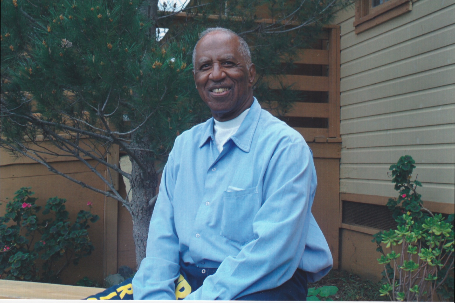 Don Bohana is seen here wearing his prison uniform in this recent family photo.