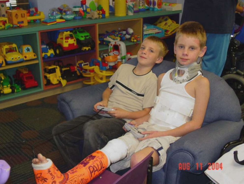 PHOTO: Cody Kimball visits Justin Kimball in the hospital in 2004.