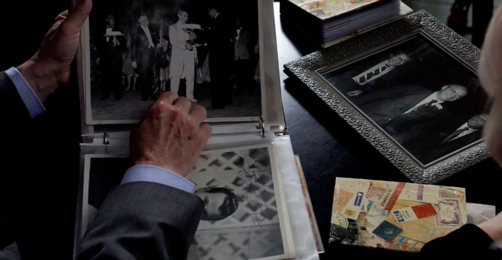 PHOTO: ABC News' Chris Connelly goes through old photos of Johnny Pappas in an interview with Pappas' niece, Patricia Haas.