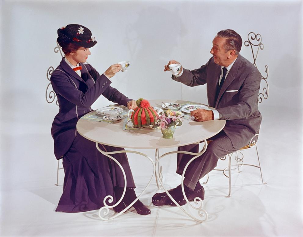 PHOTO: Julie Andrews, in costume as Mary Poppins, and Walt Disney pose with teacups during the production of 1964's "Mary Poppins."