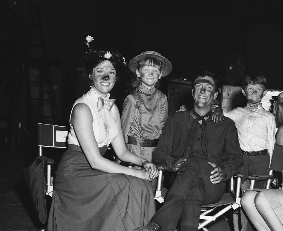 PHOTO: Julie Andrews, Karen Dotrice, Dick Van Dyke and Matthew Garber enjoy a moment of relaxation on the set of "Mary Poppins."