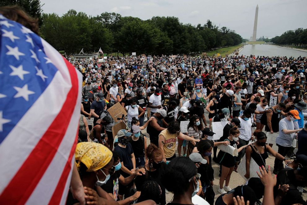 PHOTO: Demonstrators pray at the Lincoln Memorial during a protest against racial inequality in the aftermath of the death in Minneapolis police custody of George Floyd, in Washington, June 6, 2020.