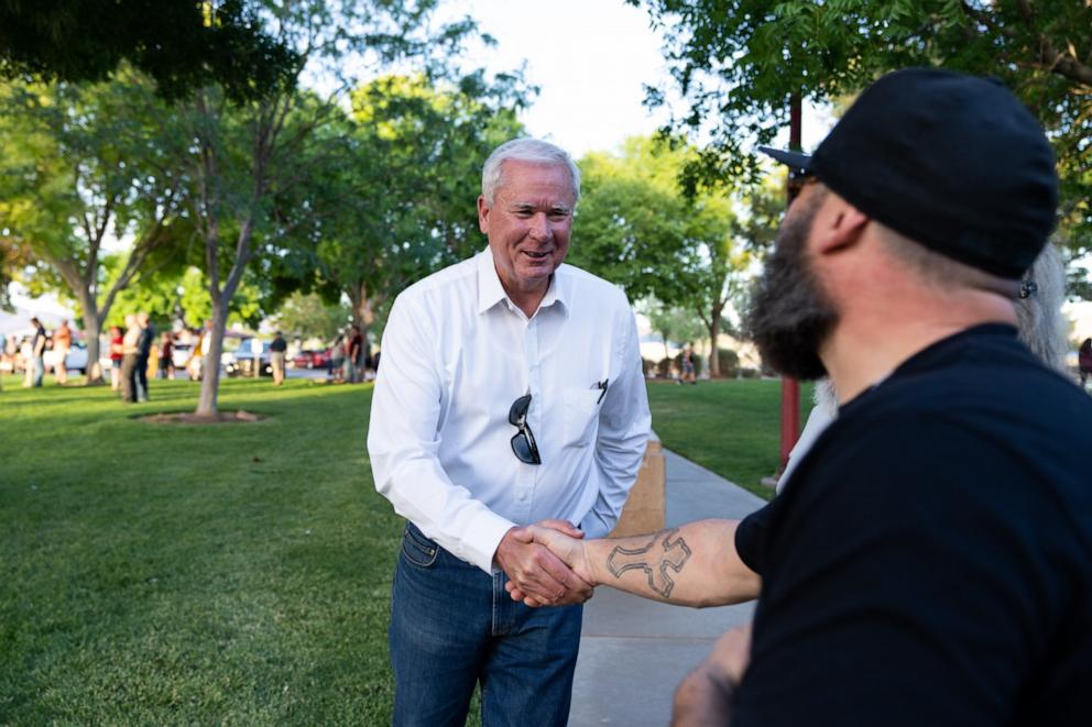 PHOTO: Mark Robertson, Republican candidate in Nevada's 1st congressional district, speaks with attendees at a meet and greet event at Mission Hills Park ahead of the Nevada primary in Henderson, Nev., May 26, 2022.