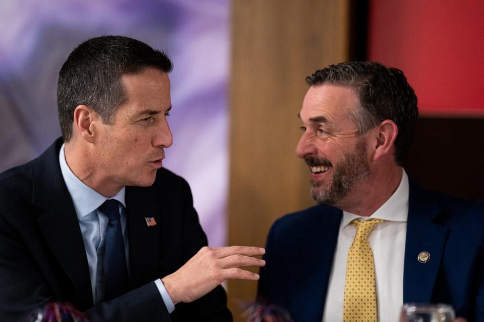 PHOTO: From left, Republican candidate for Senate Bernie Moreno speaks with Republican candidate for Ohio's 6th district Michael Rulli at the Columbiana County Lincoln Day Dinner in Salem, Ohio on March 15, 2024. 