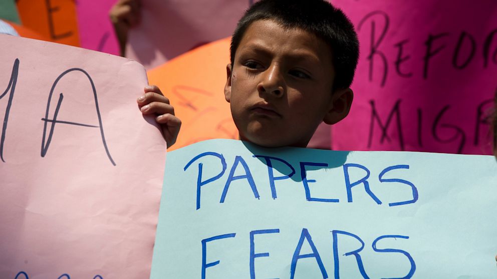 PHOTO: A boy born in the United States and deported to Mexico takes part in a protest organized by the Meso-American Migrant Movement to demand the deportation of Mexicans from the US to stop, on May 2, 2013 in front of the U.S. embassy in Mexico City. 