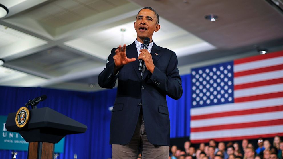 US President Barack Obama speaks during a town hall meeting at Binghamton University, on August 23, 2013 in Binghamton, New York. Obama is on a two-day bus tour through New York and Pennsylvania to discuss his plan to make college more affordable. 