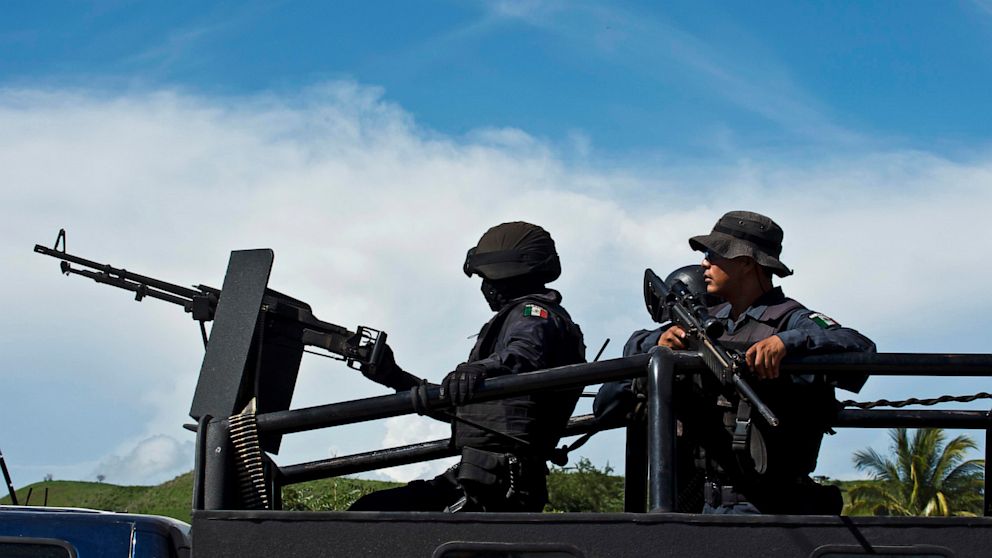 Members of the Mexican Federal Police participate in a security operation in Aguililla, Michoacan state, Mexico on July 25, 2013. 