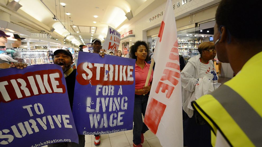 Demonstrators gather in the hundreds to protest minimum wage standards in the United States on Tuesday, May 21, 2013 at Union Station in Washington DC.   