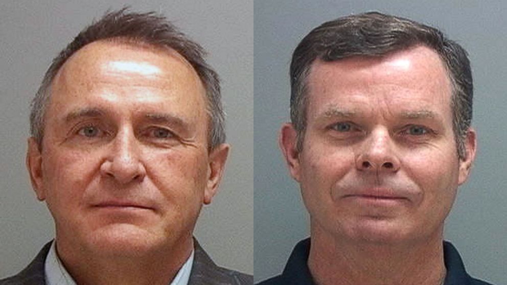 PHOTO: This combination of July 15, 2014 photos provided by the Salt Lake County Sheriff shows former Utah attorneys general Mark Shurtleff, left, and John Swallow who were taken into custody as part of a bribery investigation. 