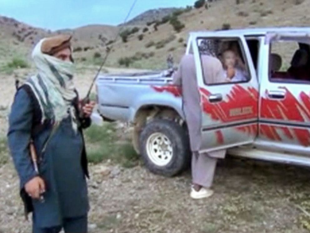 PHOTO: Sgt. Bowe Bergdahl sits in a vehicle guarded by the Taliban in eastern Afghanistan, in this image taken from video obtained from Voice Of Jihad Website, which has been authenticated based on its contents and other AP reporting.