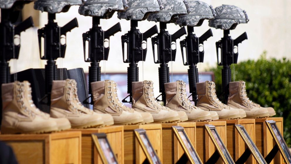 A memorial to victims of the Fort Hood shooting is shown before the start of a memorial service, to be attended by President Barack Obama, Nov. 10, 2009, at Fort Hood, Texas.