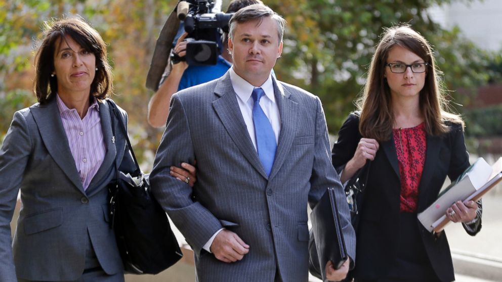 John Beliveau II, center, and his attorneys, Gretchen von Helms, left, and Jessica Carmichael arrive at the federal courthouse, Dec. 17, 2013, in San Diego, Calif.