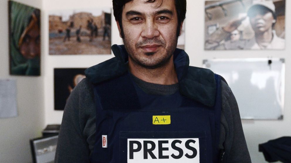 Sardar Ahmad, 40, a Kabul based staff reporter at the Agence France-Presse (AFP) news agency poses for a photo at the AFP office in Kabul hours before he, his wife and two of his three children were gunned down when four teenage gunmen attacked Kabul's Serena hotel.