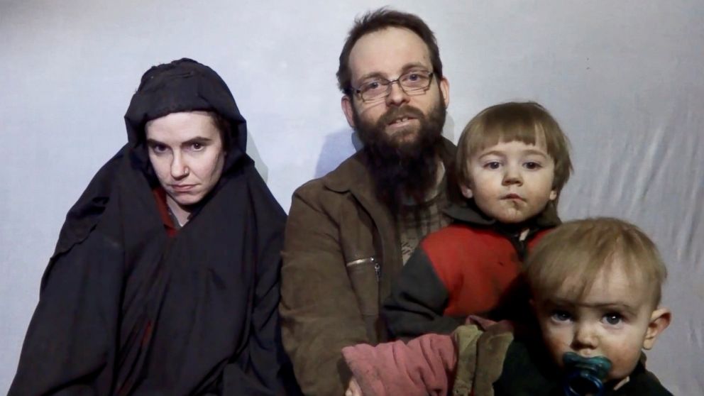 PHOTO: A still image from a video posted by the Taliban on social media, Dec. 19, 2016, shows American Caitlan Coleman next to her Canadian husband Joshua Boyle and their two sons.