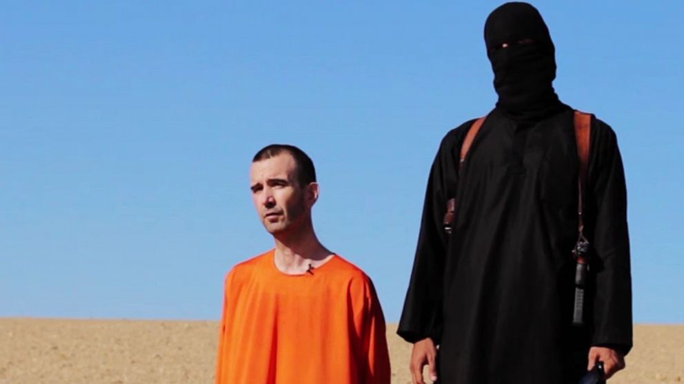 PHOTO: British citizen David Haines makes a statement to the camera in a video released online Sept. 13, 2014, that purports to show an ISIS militant executing him.