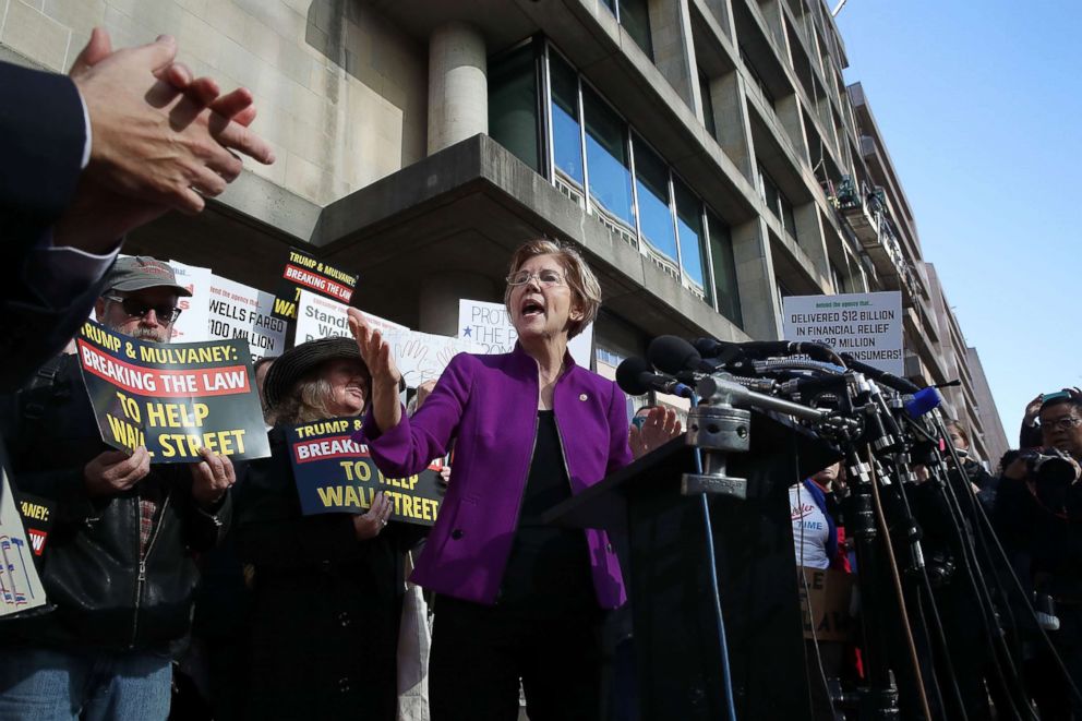 PHOTO: Sen. Elizabeth Warren speaks during a protest in front of the Consumer Financial Protection Bureau headquarters on Nov. 28, 2017 in Washington.
