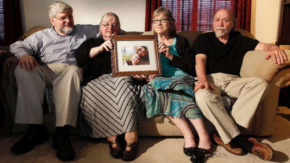 PHOTO: From left, Patrick Boyle, Linda Boyle, Lyn Coleman and Jim Coleman with a photo of their kidnapped children, Joshua Boyle and Caitlan Coleman, who were kidnapped by the Taliban in late 2012, June 4, 2014, in Stewartstown, Pa.  