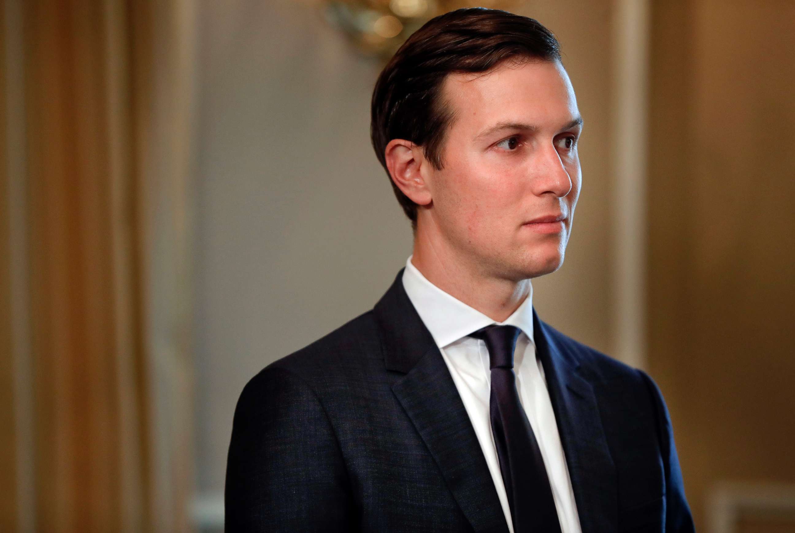 PHOTO: White House senior adviser Jared Kushner listens as President Donald Trump answers questions at a news conference, in Bedminster, N.J., Aug. 2017. 