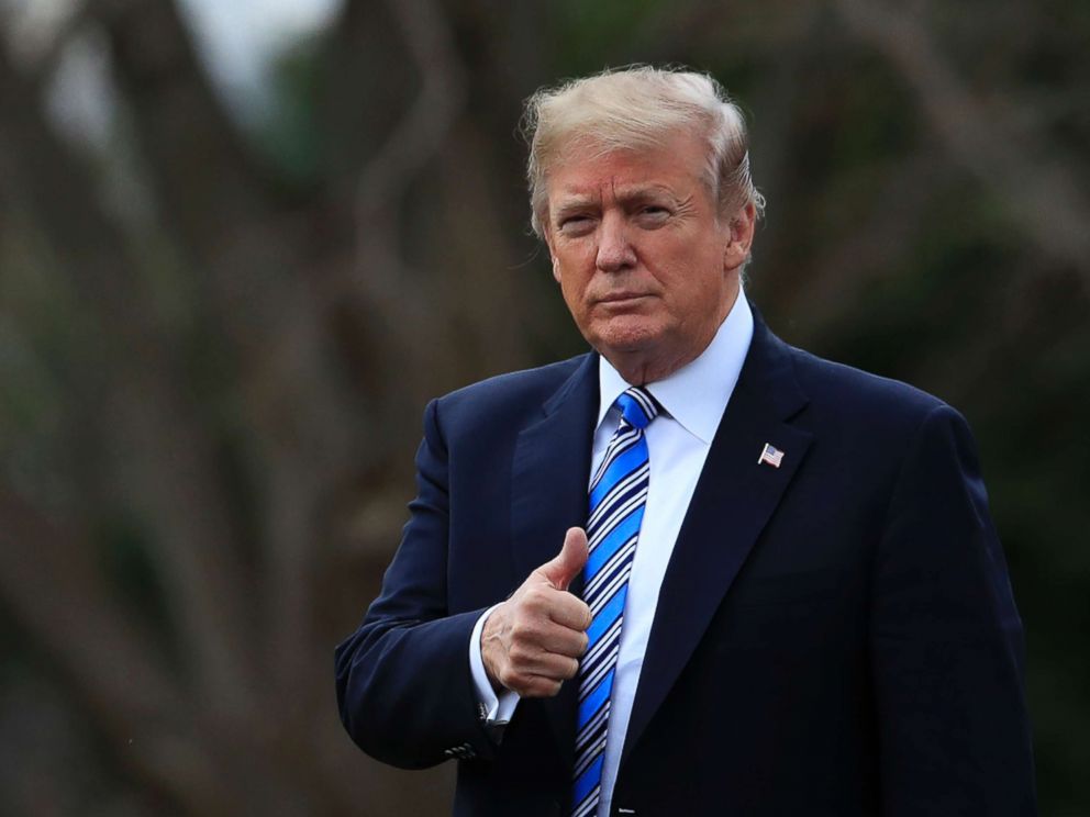 PHOTO: President Donald Trump gestures as he walks as he leaves the White House, Feb. 16, 2018, in Washington, D.C., for a trip to his private Mar-a-Lago resort in Florida.