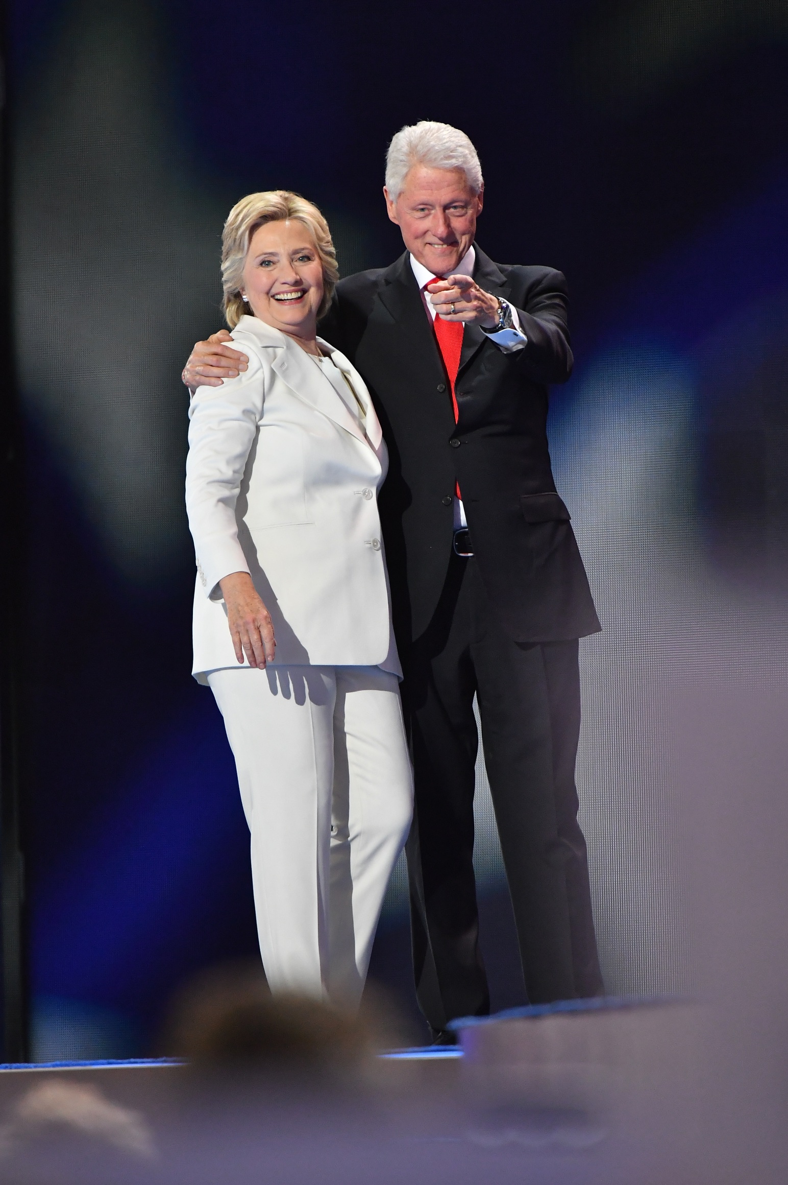 PHOTO: Hillary Clinton and Bill Clinton look over the crowd of delegates at the 2016 Democratic National Convention-Day 4 at Wells Fargo Center, July 27, 2016, in Philadelphia, Penn.  