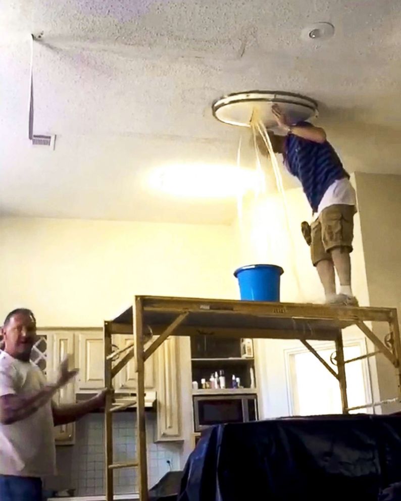 PHOTO: Carlos and Ebony January said a stream of water burst through a light fixture in their rental home after Waypoint did a poor job repairing a water leak.