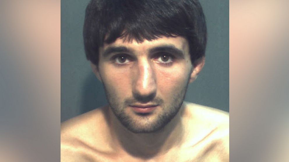 In this handout photo, Ibragim Todashev poses for his mug shot after being arrested for aggravated battery May 4, 2013 in Orlando, Fla.