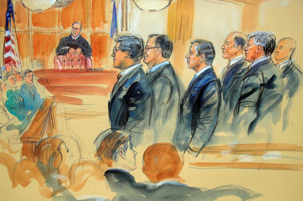 PHOTO: This courtroom sketch depicts Paul Manafort, fourth from right, standing with his lawyers in front of U.S. district Judge T.S Ellis III, and the jury during the jury selection of his trial in Alexandria, Va., July 31, 2018.