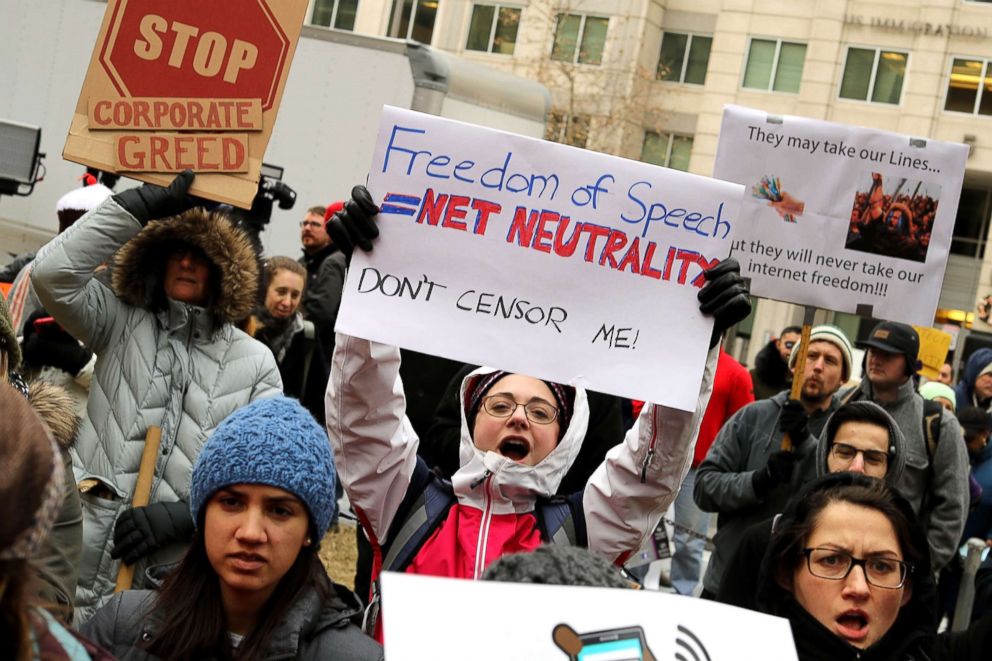PHOTO: Demonstrators rally outside the Federal Communication Commission building to protest against the end of net neutrality rules, Dec. 14, 2017 in Washington, D.C.