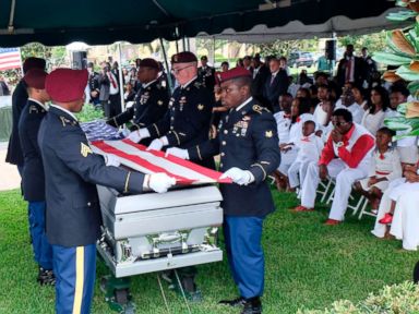 PHOTO: Members of the army honor guard fold the flag above the casket of US Army Sgt. La David Johnson during his burial service on October 21, 2017 in Hollywood, Florida. Johnson and three other US soldiers were killed in an ambush in Niger on October 4.