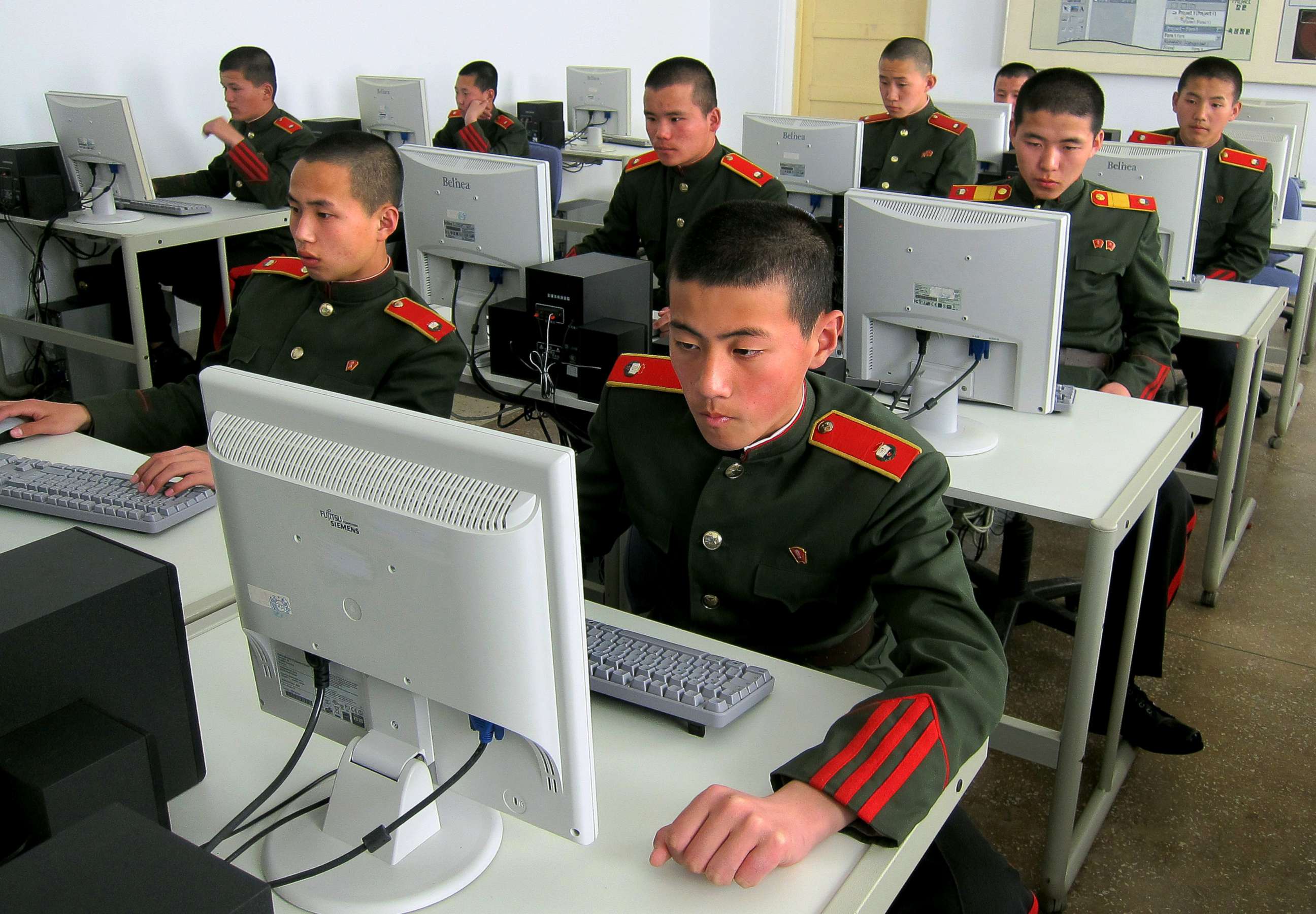 PHOTO: Students at the Mangyongdae Revolutionary School, in Pyongyang, North Korea work on computers, April 13, 2013.
