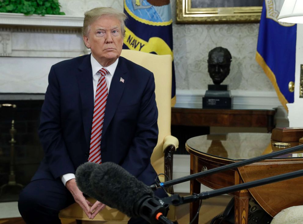 PHOTO: President Donald Trump meets with the Emir of Qatar Sheikh Tamim bin Hamad al-Thani in the Oval Office of the White House, April 10, 2018, in Washington.