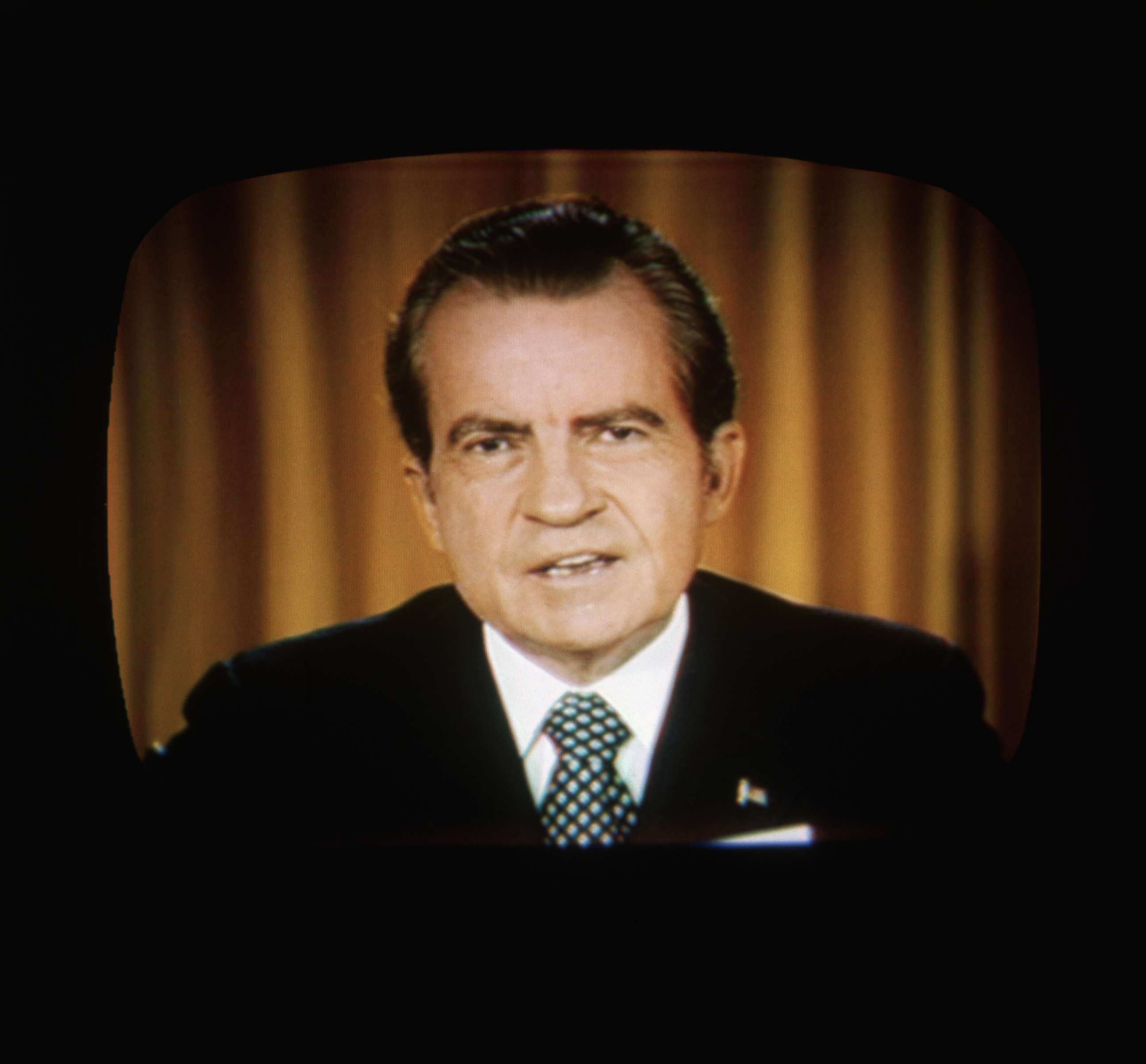 PHOTO: President Richard Nixon addresses the nation on television about the Watergate investigations, April 30, 1973.