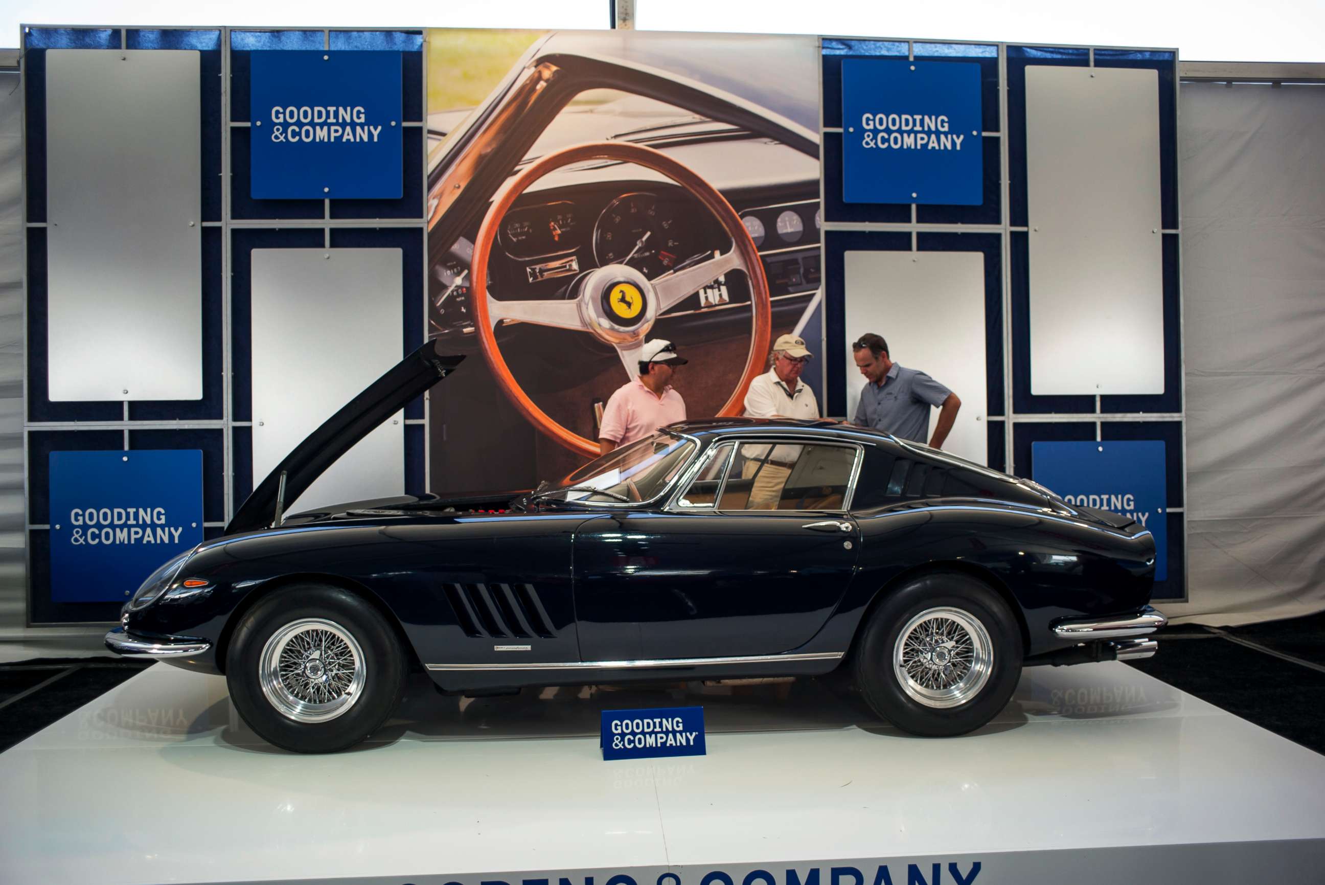 PHOTO: Attendees look at a 1967 Ferrari SpA 275 GTB/4 during an auction at the 2015 Pebble Beach Concours d'Elegance in Pebble Beach, Calif., Aug. 15, 2015.