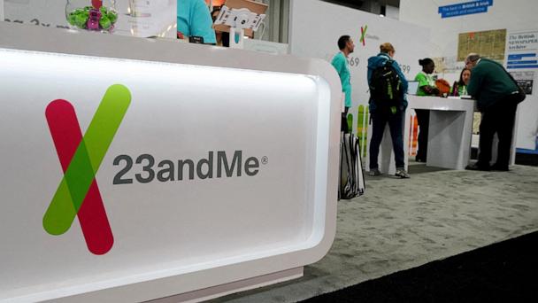 Attendees visit the 23andMe booth at the RootsTech annual genealogical event in Salt Lake City, Utah, February 28, 2019.