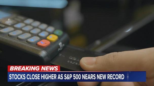 Stocks close higher as S&P 500 nears new record